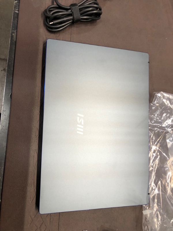 Photo 16 of MSI Prestige 14 Evo Professional Laptop: 14" FHD Ultra-Thin Bezel Display, Intel Core i7-1185G7, Intel Iris Xe, 16GB RAM, 512GB NVMe SSD, Thunderbolt 4, Win10 Home, Intel Evo, Carbon Gray (A11M-629)