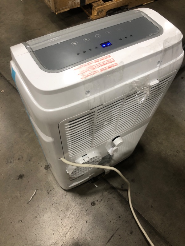 Photo 2 of **Minor Damage** BLACK+DECKER 8,000 BTU Portable Air Conditioner with Remote Control, White
