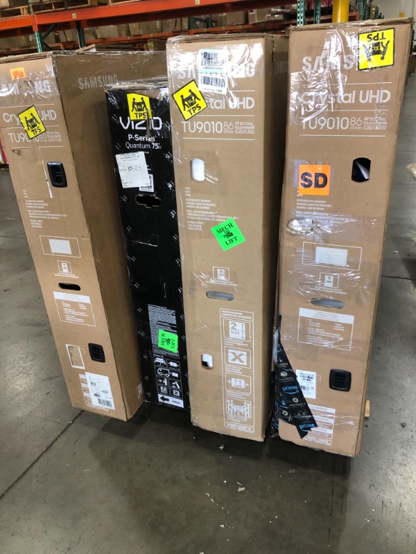 Photo 1 of MIXED PALLET OF DAMAGED TVS**NON FUNCTIONAL SET OF 4**NO REFUNDS**