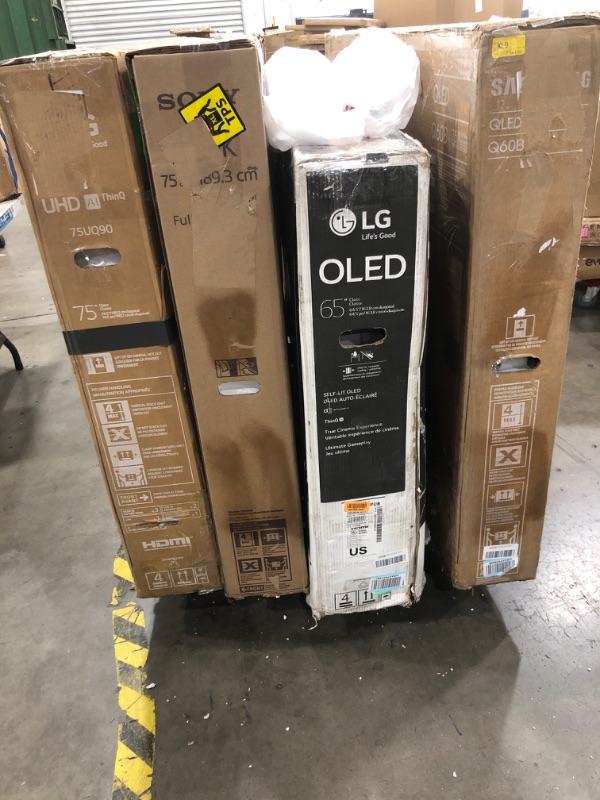 Photo 2 of MIXED PALLET OF DAMAGED TVS**SET OF 4**NON FUNCTIONAL NO REFUNDS**