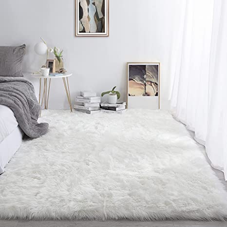 Photo 1 of ***see note*** HOMBYS 8x10 Oversized Faux Fur Area Rug for Living Room Bedroom, Super Soft & Fluffy White Faux Sheepskin Play Carpet for Kids Baby and Children, Luxury Plush Furry Décor Shaggy Feet Mat for Bedside
