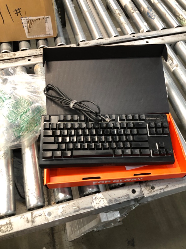 Photo 1 of SteelSeries Apex 3 TKL RGB Gaming Keyboard – Tenkeyless Compact Form Factor - 8-Zone RGB Illumination – IP32 Water & Dust Resistant – Whisper Quiet Gaming Switch – Gaming Grade Anti-Ghosting