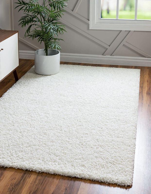 Photo 1 of 8X10FT WHITE AREA RUG