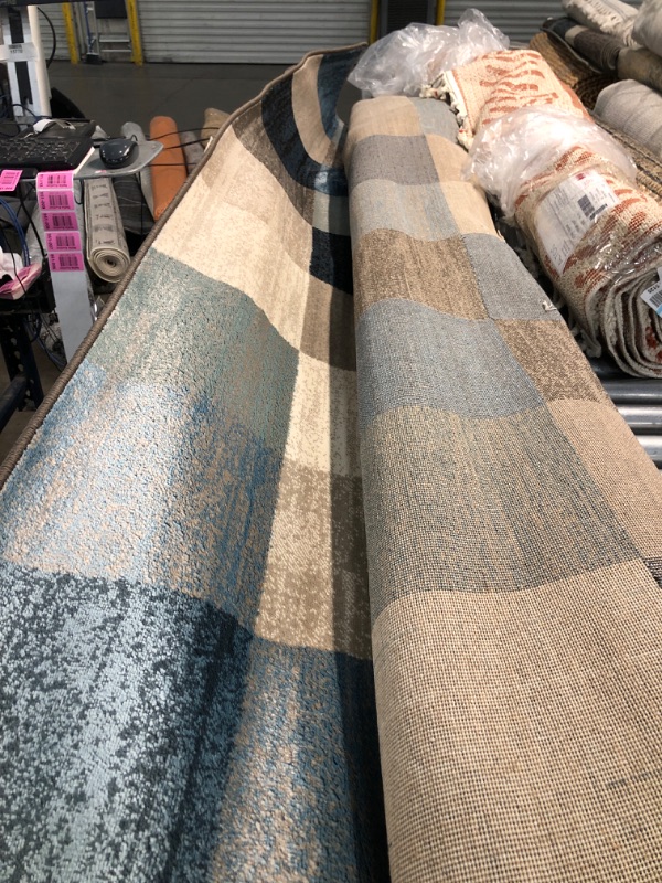 Photo 1 of 7'6X9'6 FT BROWN/BLUE PATTERN AREA RUG