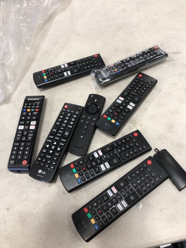 Photo 1 of MIXED BUNDLE OF TV REMOTES**MIXED TYPES**8 UNITS**