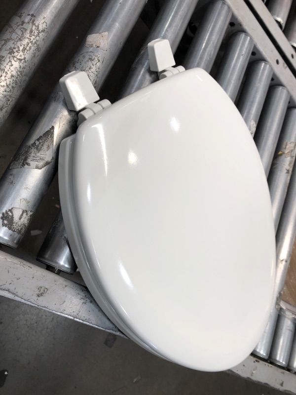 Photo 2 of **MISSING HARDWARE** KOHLER K-4647-0 Stonewood Molded-Wood with Color-Matched Plastic Hinges Elongated Toilet Seat, White