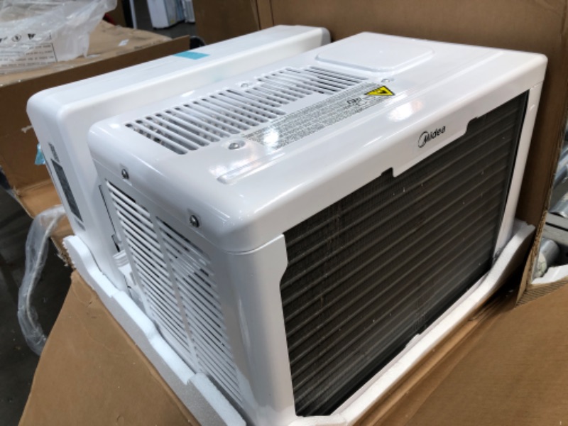 Photo 1 of Midea 8,000 BTU U-Shaped Smart Inverter Window Air Conditioner–Cools up to 350 Sq. Ft., Ultra Quiet with Open Window Flexibility, Works with Alexa/Google Assistant, 35% Energy Savings, Remote Control 8000 BTU AC