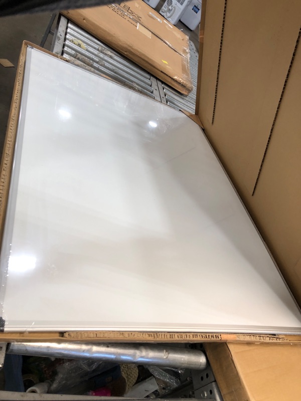 Photo 2 of **SMALL DENTS FROM SHIPPIN** Amazon Basics Magnetic Dry Erase White Board, 35 x 47-Inch Whiteboard - Silver Aluminum Frame
