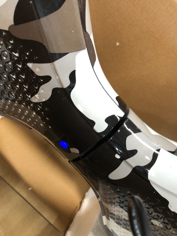 Photo 1 of  Hover-1 Helix Electric Hoverboard | 7MPH Top Speed, 4 Mile Range, 6HR Full-Charge, Built-in Bluetooth Speaker, Rider Modes: Beginner to Expert Hoverboard Camo