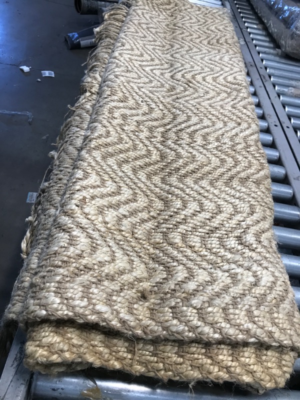 Photo 1 of  NATURAL WEAVED AREA RUG 5' X 8'