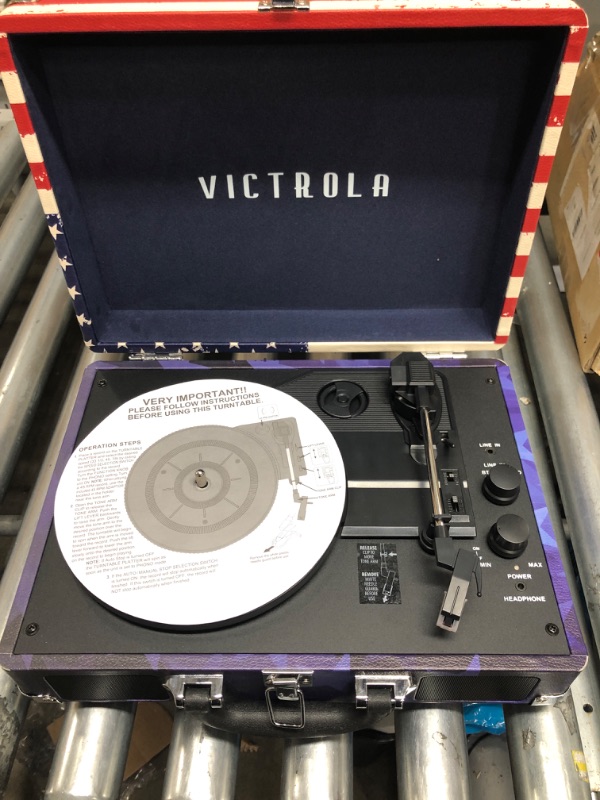 Photo 2 of Victrola Vintage 3-Speed Bluetooth Portable Suitcase Record Player with Built-in Speakers Upgraded Turntable Audio Sound Includes Extra Stylus American Flag (VSC-550BT-USA) Amercan