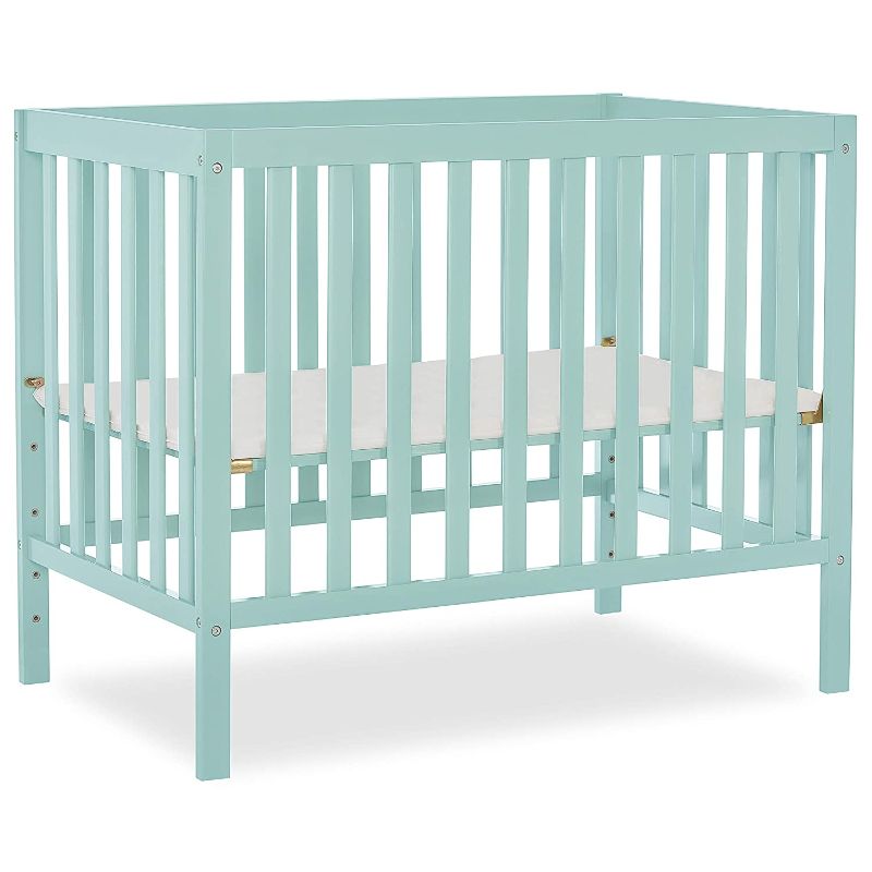 Photo 1 of Dream On Me Edgewood 4-In-1 Convertible Mini Crib In Mint, JPMA Certified, Non-Toxic Finish, New Zealand Pinewood, With 3 Mattress Height Settings, Included 1" Mattress Pad
