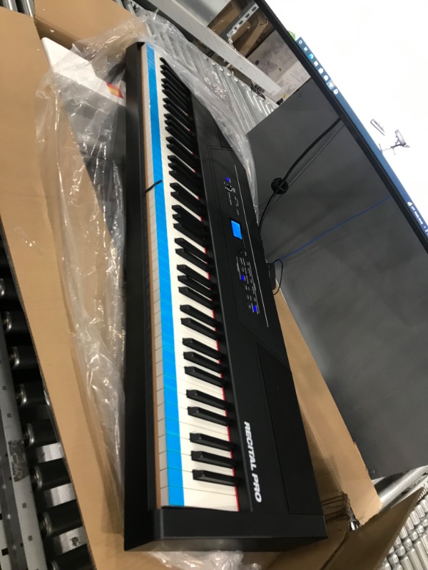 Photo 3 of Alesis Recital Pro - 88 Key Digital Piano Keyboard with Hammer Action Weighted Keys, 2x20W Speakers, 12 Voices, Record and Lesson Mode, FX and Display
