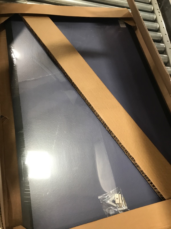 Photo 2 of Amazon Basics Magnetic Dry Erase White Board, 35 x 23-Inch Whiteboard - Black Wooden Frame 23"x35" Magnetic, Wood Frame