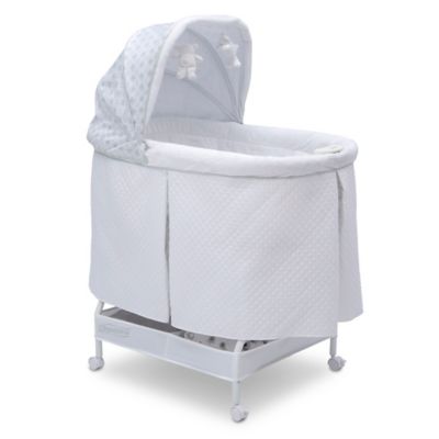 Photo 1 of Beautyrest Silent Auto Gliding Lux Bassinet in Arcadia by Delta Children White/light Blue
