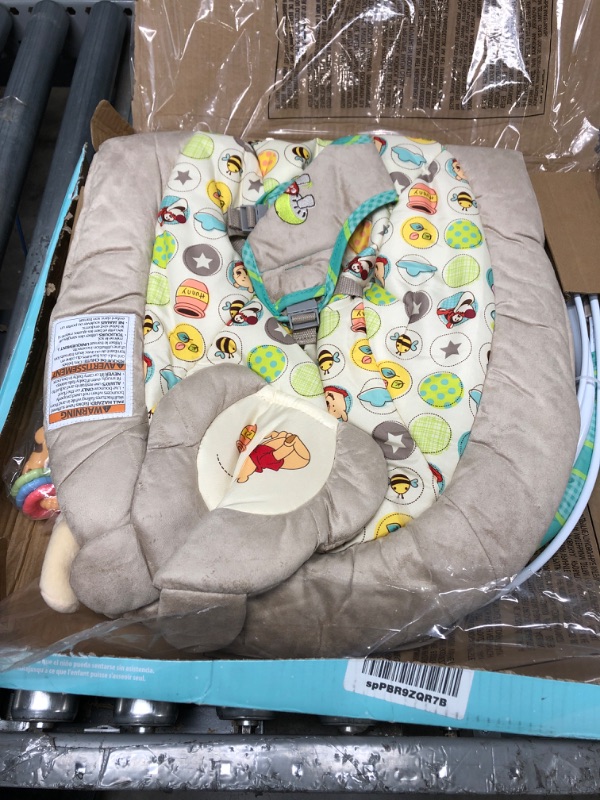 Photo 2 of Bright Starts Winnie the Pooh Dots & Hunny Pots Baby Bouncer with Vibrating Infant Seat, Music & 3 Playtime Toys, 23x19x23 Inch
