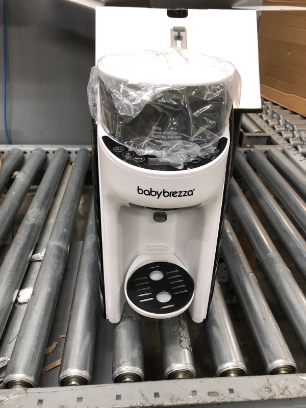 Photo 2 of Baby Brezza Formula Pro Advanced WiFi Formula Dispenser Machine - Automatically Mix a Warm Formula Bottle Instantly - Easily Make Bottle with Automatic Powder Blending
