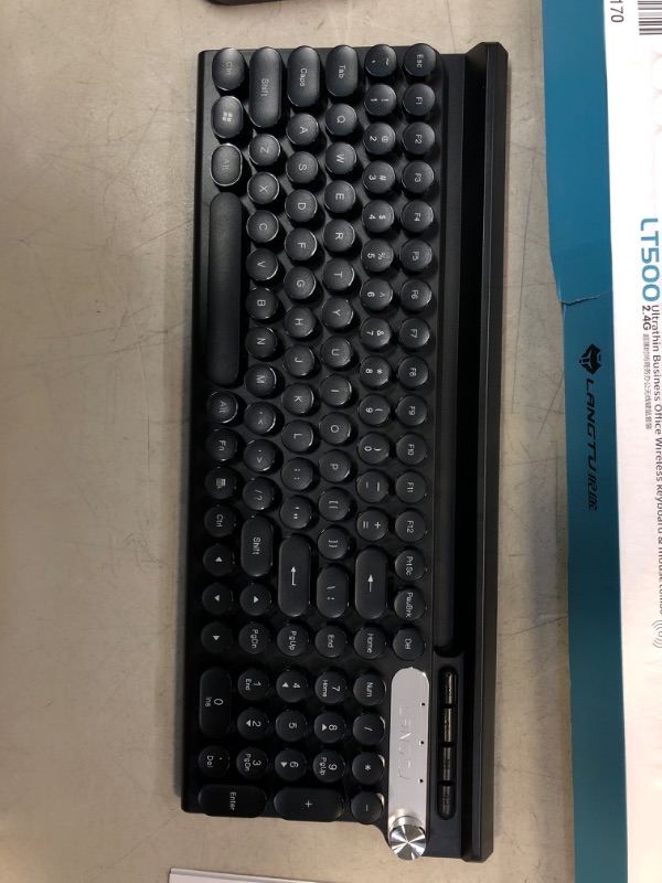 Photo 3 of LANGTU LT500 4-COLOR RECHARGEABLE 2.4G WIRELESS ULTRA-THIN KEYBOARD AND 1500DPI ULTRA-THIN MOUSE OFFICE COMBO FOR PC, LAPTOP AND TABLET **  USED BUT LOOKS BRAND NEW 
