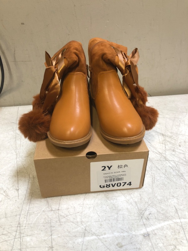 Photo 1 of Coutgo Girls' Boots Mid Calf Lug Sole Side Zipper Winter Boot with Bowknot Pom-poms 2 Little Kid Brown
