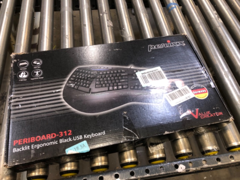 Photo 1 of PERIXX ergonomic keyboard 