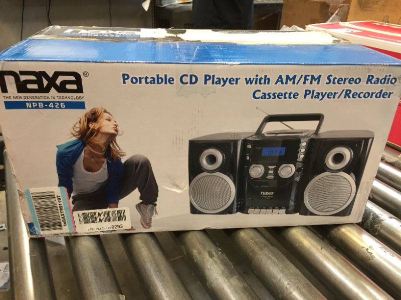 Photo 4 of NAXA Electronics NPB-426 Portable CD Player with AM/FM Stereo Radio, Cassette Player/Recorder and Twin Detachable Speakers
