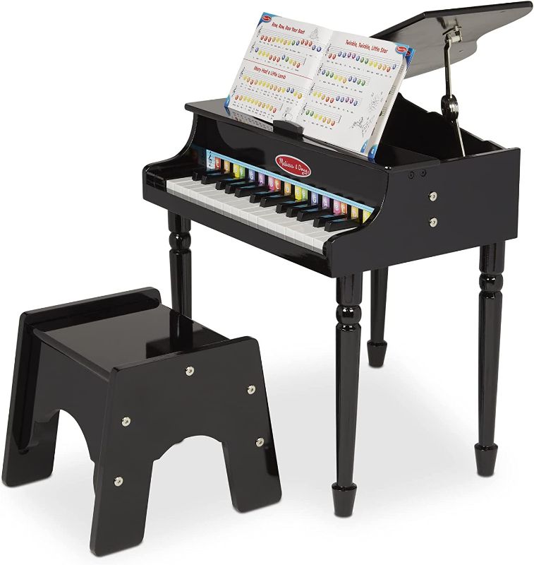 Photo 1 of 
Melissa & Doug Learn-to-Play Classic Grand Piano, Mini Keyboard with 30 Hand-Tuned Keys (23.65” H x 21.4” W x 10.05” L)