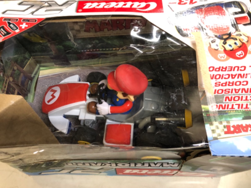 Photo 3 of Carrera RC Officially Licensed Mario Kart Racer 1: 16 Scale 2.4 Ghz Remote Radio Control Car Vehicle Mario Kart Race Kart - Mario
BOX IS SLIGHTLY DAMAGED