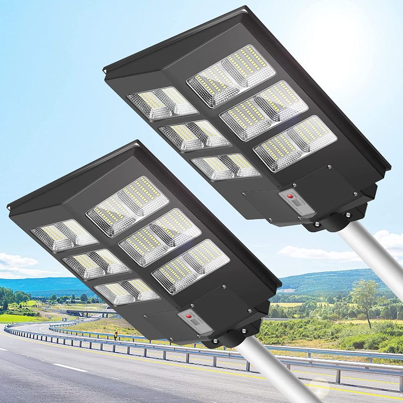 Photo 1 of 600W Solar Street Lights Outdoor Waterproof, 60000LM High Brightness Dusk to Dawn LED Lamp, with Motion Sensor and Remote Control, for Parking Lot, Yard, Garden, Patio, Stadium, Piazza (2 Packs) -- item is new, missing 1 back cover of remote