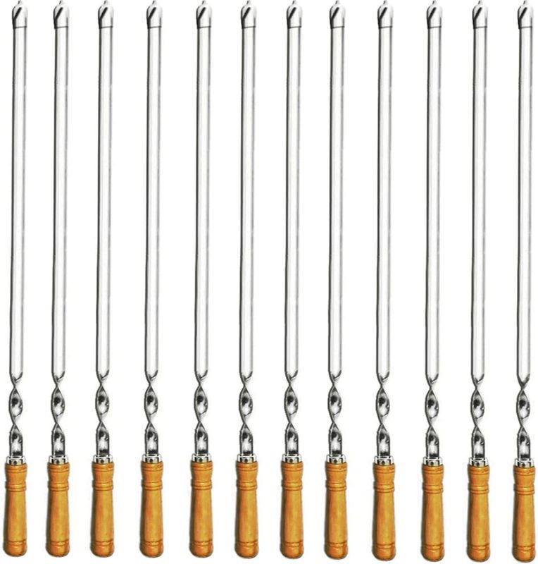 Photo 1 of Amestar 12 Pack Kabob Skewers BBQ Barbecue Skewers Stainless Steel Sticks 23.5 Inch Heavy Duty Large Wide Reusable with Nonslip Wooden Handle Ideal for Shish Kebab Chicken Shrimp and Vegetables --- item is new, scratches and scuffs on item as shown in pic