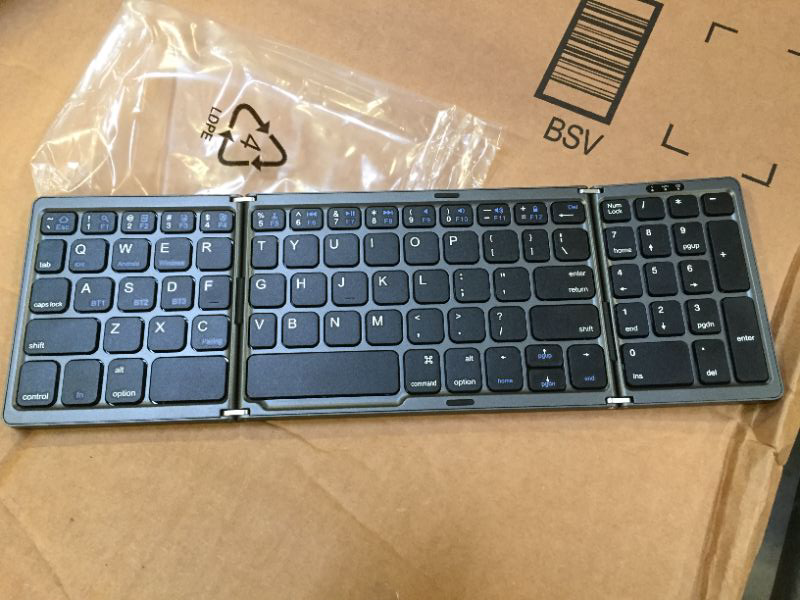 Photo 2 of HAMOPY Foldable Keyboard, Portable Tri-Folding Wireless Keyboard with Sensitive Touchpad Mouse, Rechargeable Keyboard Mini Travel Keyboard for Windows iOS Android Phone PC Table, Sync up to 3 Devices
