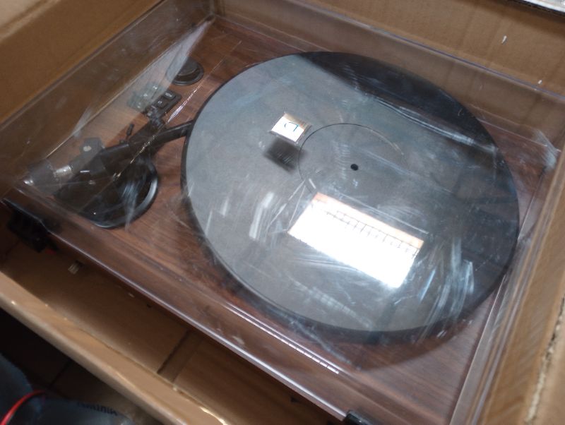 Photo 3 of Record Player Natural Wood with Two Speakers ---- moderate used, scuffs and scratches on item as shown in pictures, turns on