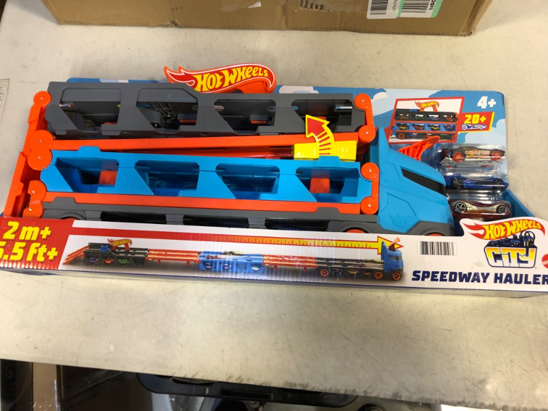 Photo 2 of ?Hot Wheels Speedway Hauler Storage Carrier with 3 1:64 Scale Cars & Convertible 6-Foot Drag Race Track for Kids 4 to 8 Years Old, Stores 20+ Cars & Connects to Other Hot Wheels City Sets & Tracks
