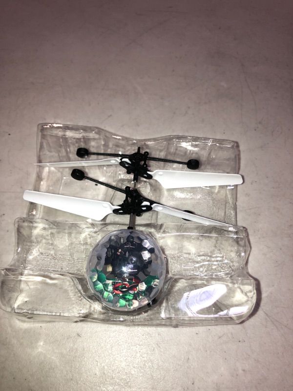 Photo 3 of Flying Toy Ball Infrared Induction RC Flying Toy Built-in LED Light Disco Helicopter Shining Colorful Flying Drone Indoor and Outdoor Games Toys for 3 4 5 6 7 8 9 10 Year Old Boys and Girls