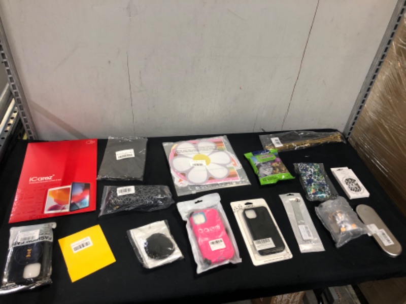 Photo 1 of 
Small miscellaneous items and assortment of phone cases