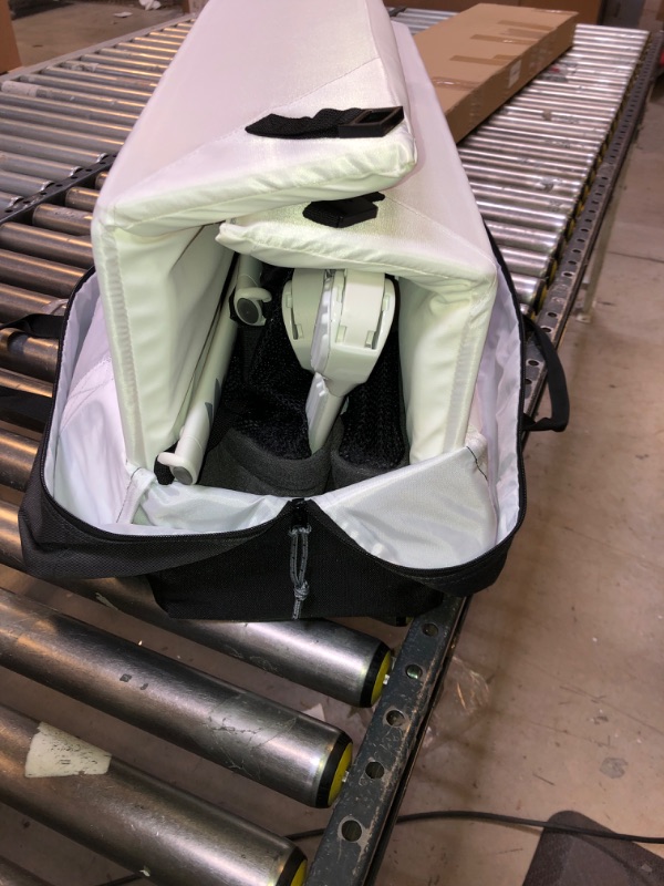 Photo 1 of Lotus Travel Crib - Backpack Portable, Lightweight, Easy to Pack Play-Yard with Comfortable Mattress - Certified Baby Safe