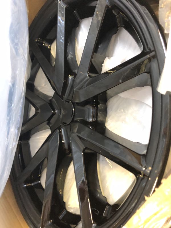 Photo 1 of 20" Black Plastic Hubcaps 4 Pack 