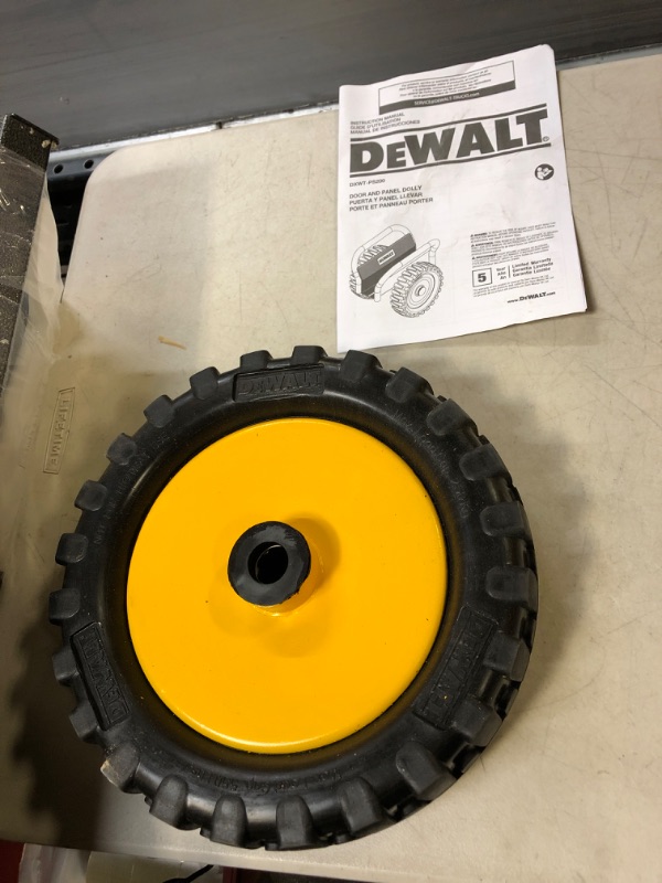 Photo 2 of Dewalt Door Dolly Panel Mover, 1,200-Pound Weight Capacity, up to 3.13-Inches Width Capacity, 12-Inch No-Flat Wheels, Move Sheetrock, Plywood, OSB, Doors and More (DXWT-PS200) Standard Dolly - MISSING : SOME HARDWEAR - DAMAGE : DIRTY