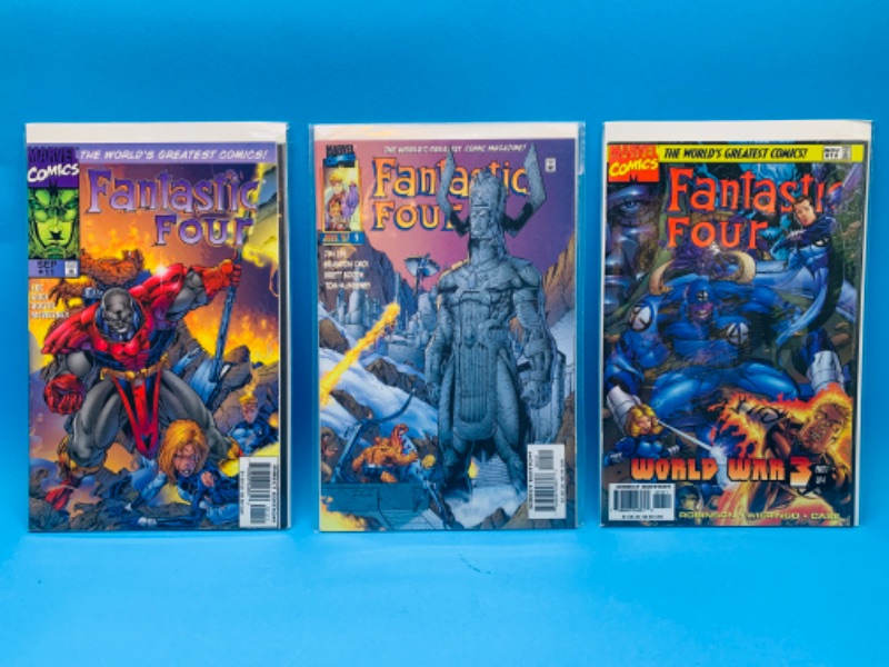 Photo 1 of 015014…3 fantastic four comics in plastic sleeves 