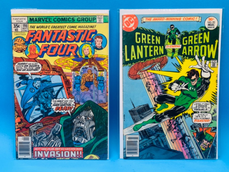 Photo 1 of 015030… 2 vintage $.30 and $.35 comics in plastic sleeves