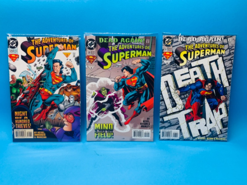 Photo 1 of 015054…  3 Superman comics in plastic sleeves 