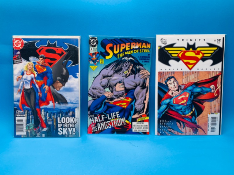 Photo 1 of 015055…  3 Superman comics in plastic sleeves 