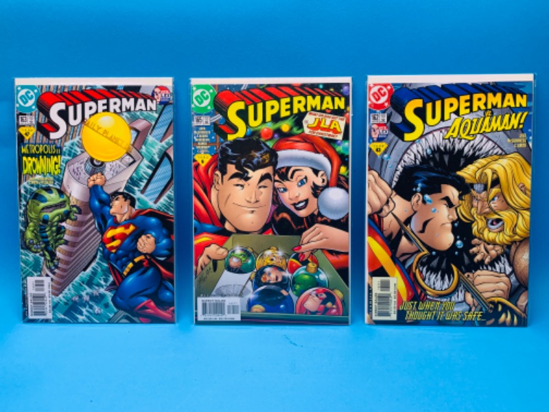 Photo 1 of 015066… 3 Superman comics in plastic sleeves 