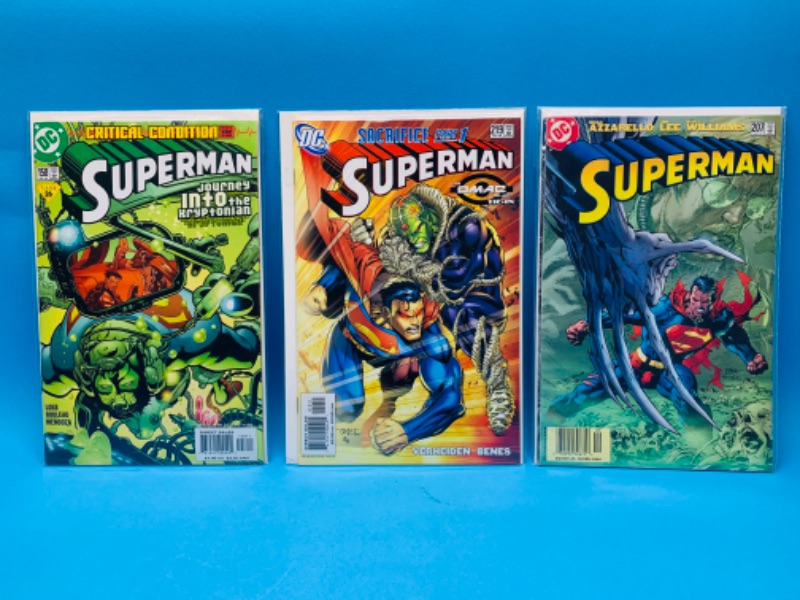 Photo 1 of 015075… 3 Superman comics in plastic sleeves 