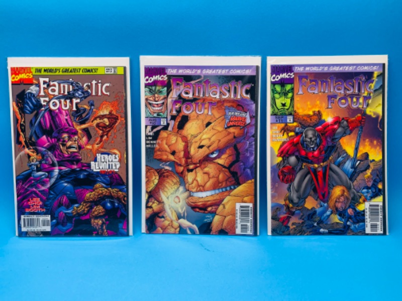 Photo 1 of 015077… 3  fantastic four comics in plastic sleeves 