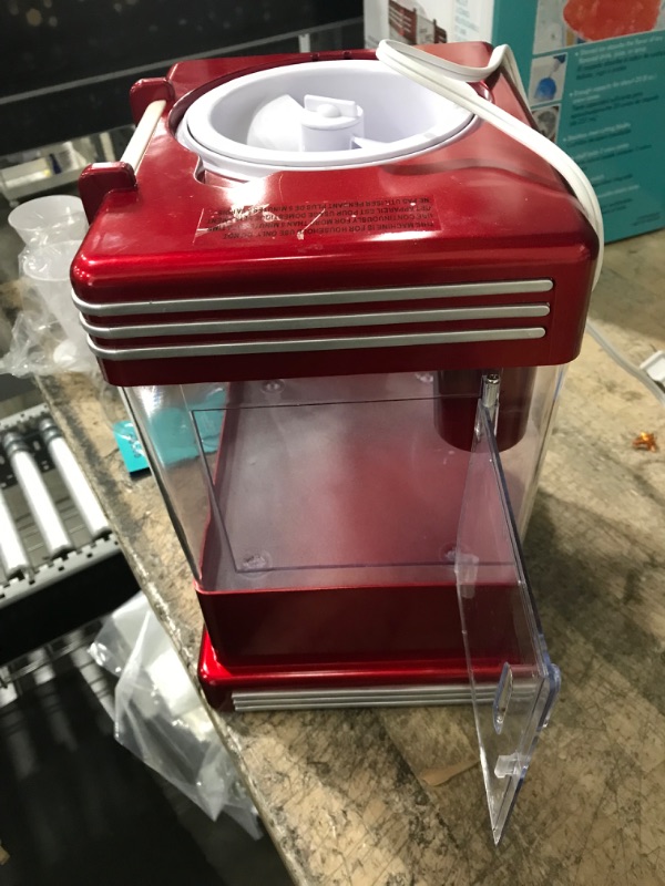 Photo 3 of Nostalgia Retro Table-Top Snow Cone Maker, Makes 20 Icy Treats, Shaved Ice Machine Includes 2 Reusable Plastic Cups & Ice Scoop, Retro Red