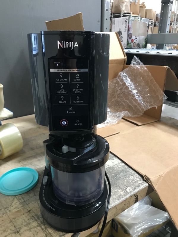 Photo 2 of Ninja NC299AMZ CREAMi Ice Cream Maker, for Gelato, Mix-ins, Milkshakes, Sorbet, Smoothie Bowls & More, 7 One-Touch Programs, with (1) Pint Container & Lid, Compact Size, Perfect for Kids, Matte Black
