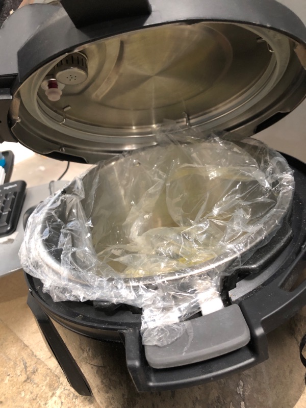 Photo 1 of Instant Pot Pro 10-in-1 Pressure Cooker, Slow Cooker, Rice/Grain Cooker, Steamer, Sauté, Sous Vide, Yogurt Maker, Sterilizer, and Warmer, Includes App With Over 800 Recipes, Black, 6 Quart 6QT Pro