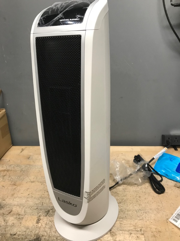 Photo 1 of Lasko Oscillating Digital Ceramic Tower Heater for Home with Overheat Protection, Timer and Remote Control, 22.75 Inches, 1500W, White, 5165
