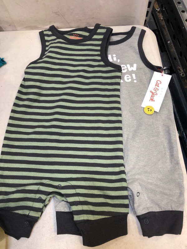 Photo 2 of Baby 2pk 'New Here' Striped Romper - Cat & Jack™
SIZE 6-9 M 