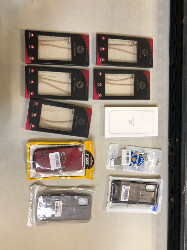 Photo 1 of MISCELLANEOUS LOT OF PHONE CASES AND BAND 